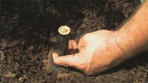 A Shoreline Sprinkler Repair tech installs a new pop up head